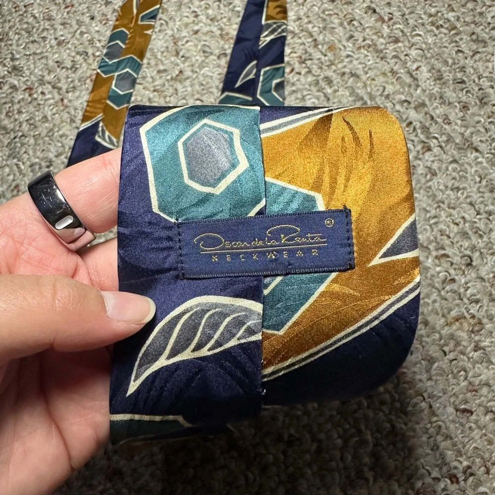 Two (2) Oscar De La Renta 100% silk patterned ties